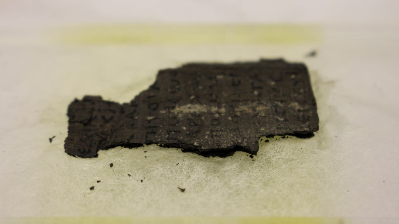 727211 Fragment of Herculaneum scroll is fixed in place at a Diamond Light Source experimental station after it was scanned using bright x-rays in Didcot, Britain, September 30, 2019.